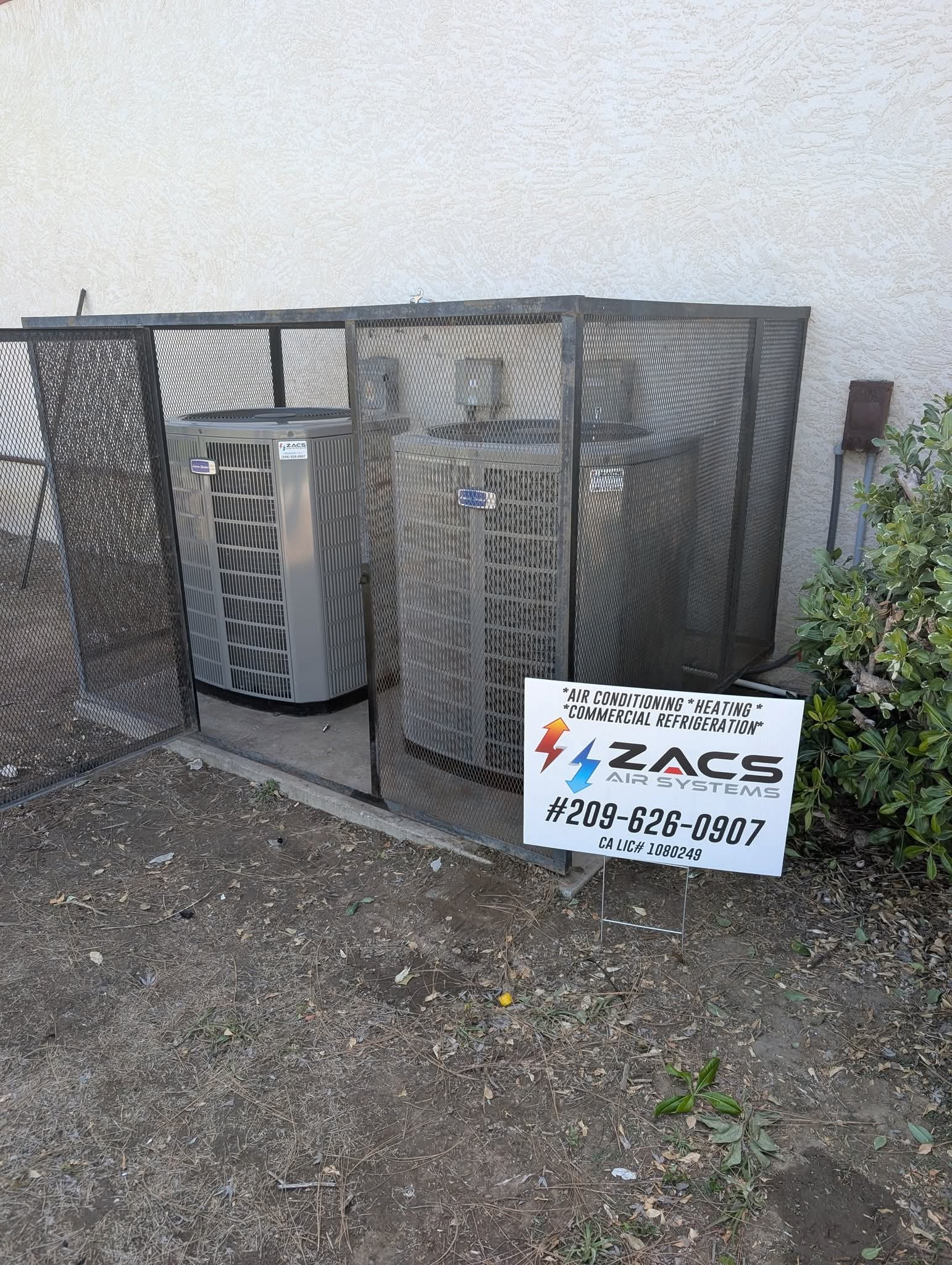 Mini split heat pump mounted on exterior wall