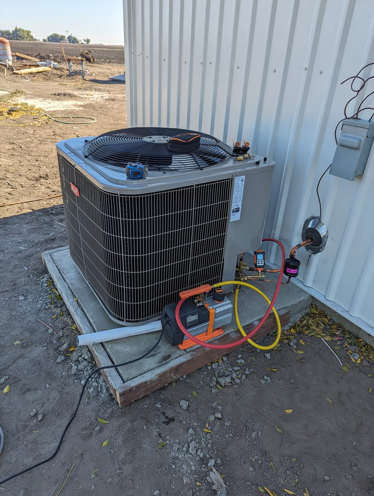 HVAC technician sealing and securing ductwork