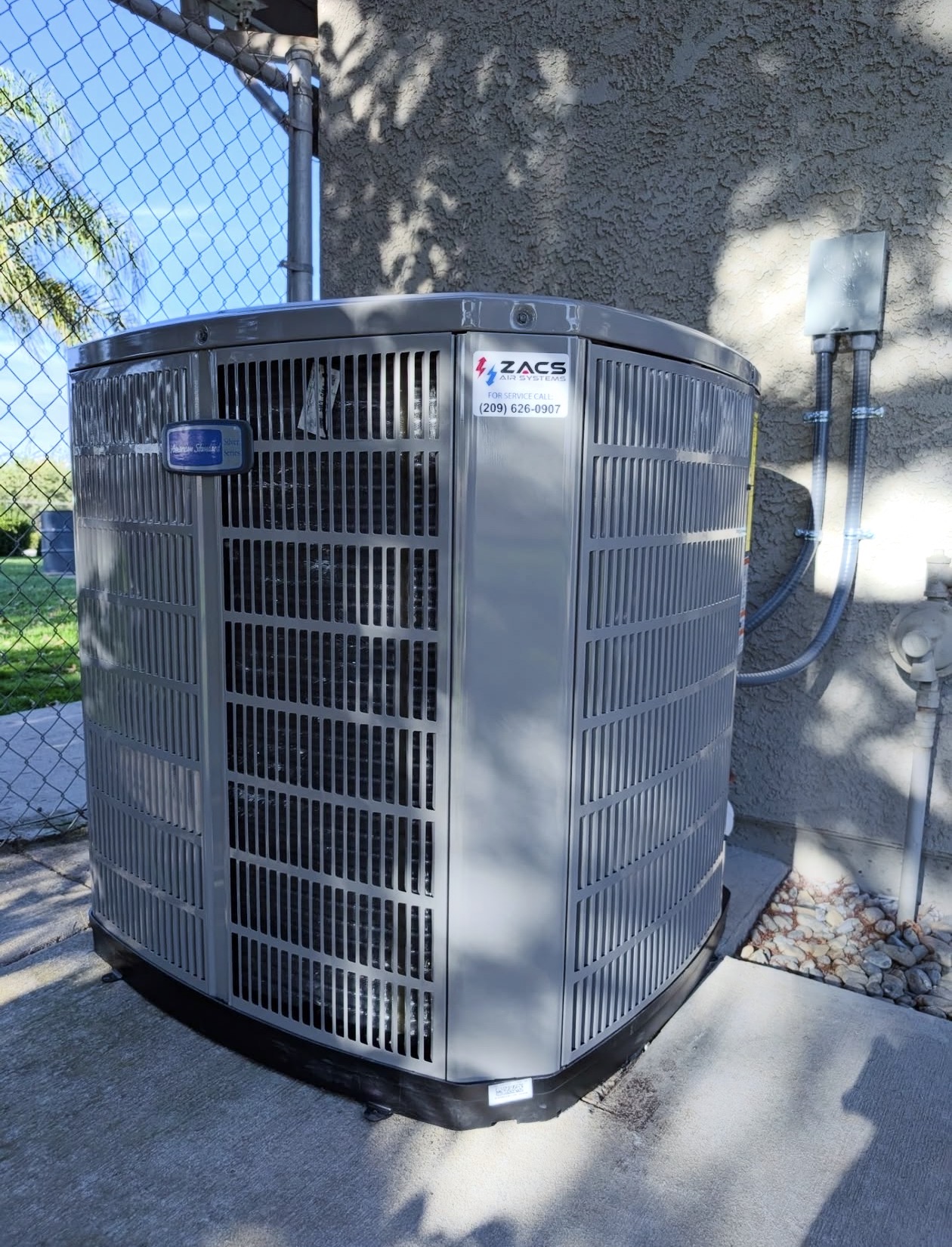 Outdoor AC condenser unit installed by ZACS AIR SYSTEMS