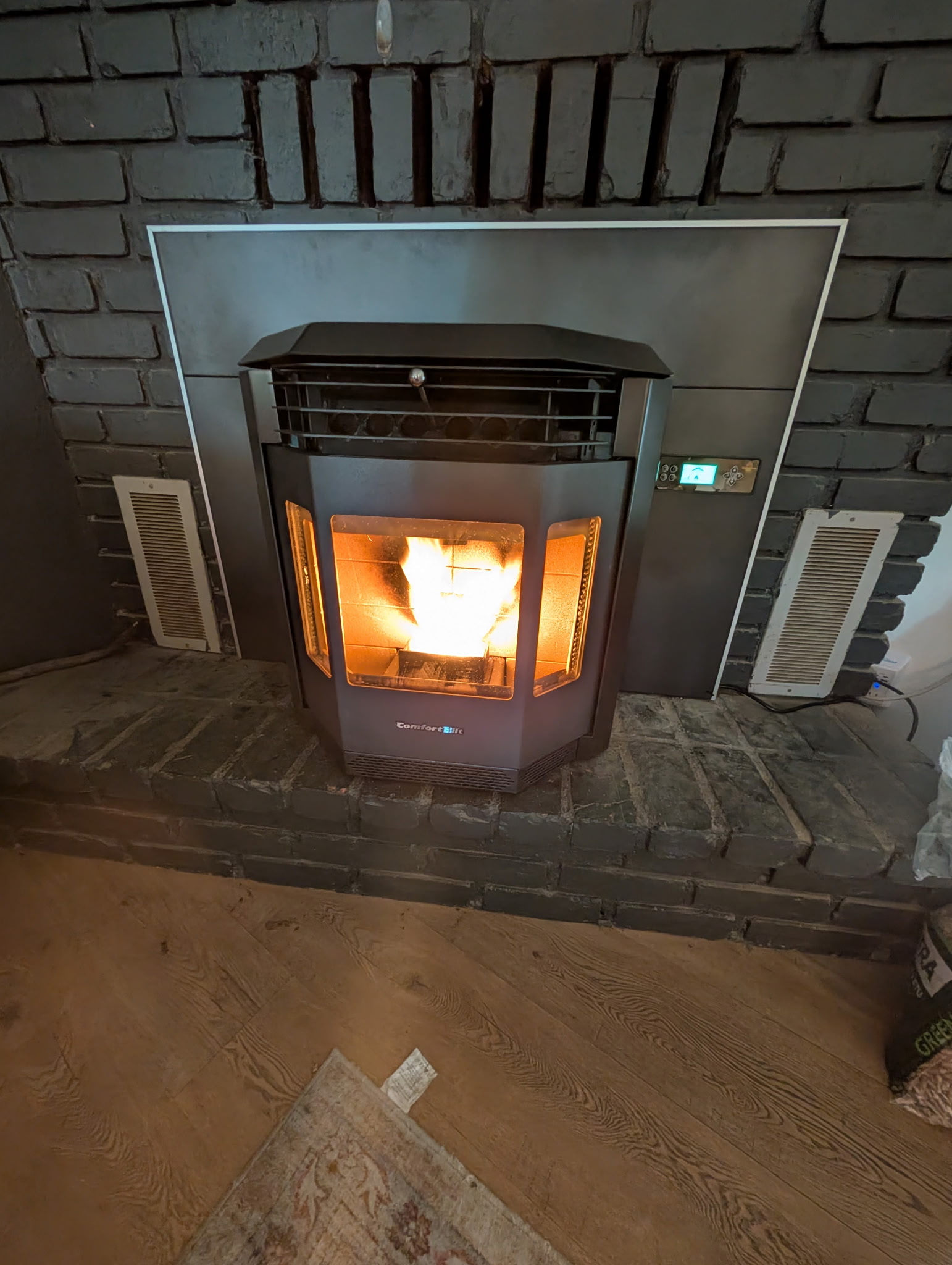 Technician installing insulated HVAC ducting